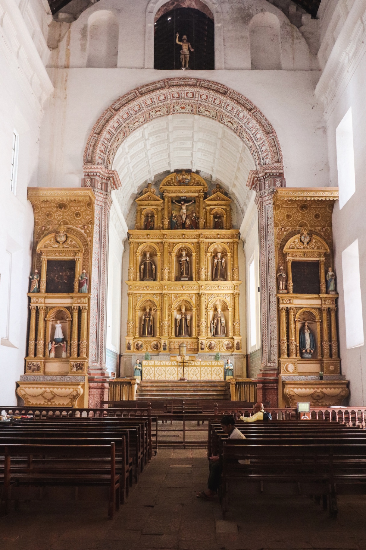 GOA FAMILIA - Church interior with ornate golden altar and Portuguese colonial architecture